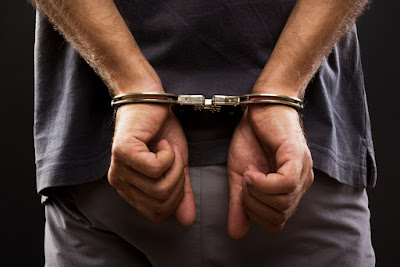 handcuffed2Bbehind2Bback